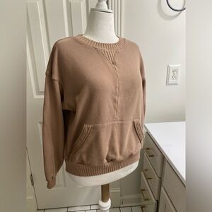 Anrabess tan sweater with front pouch. Size Lg.